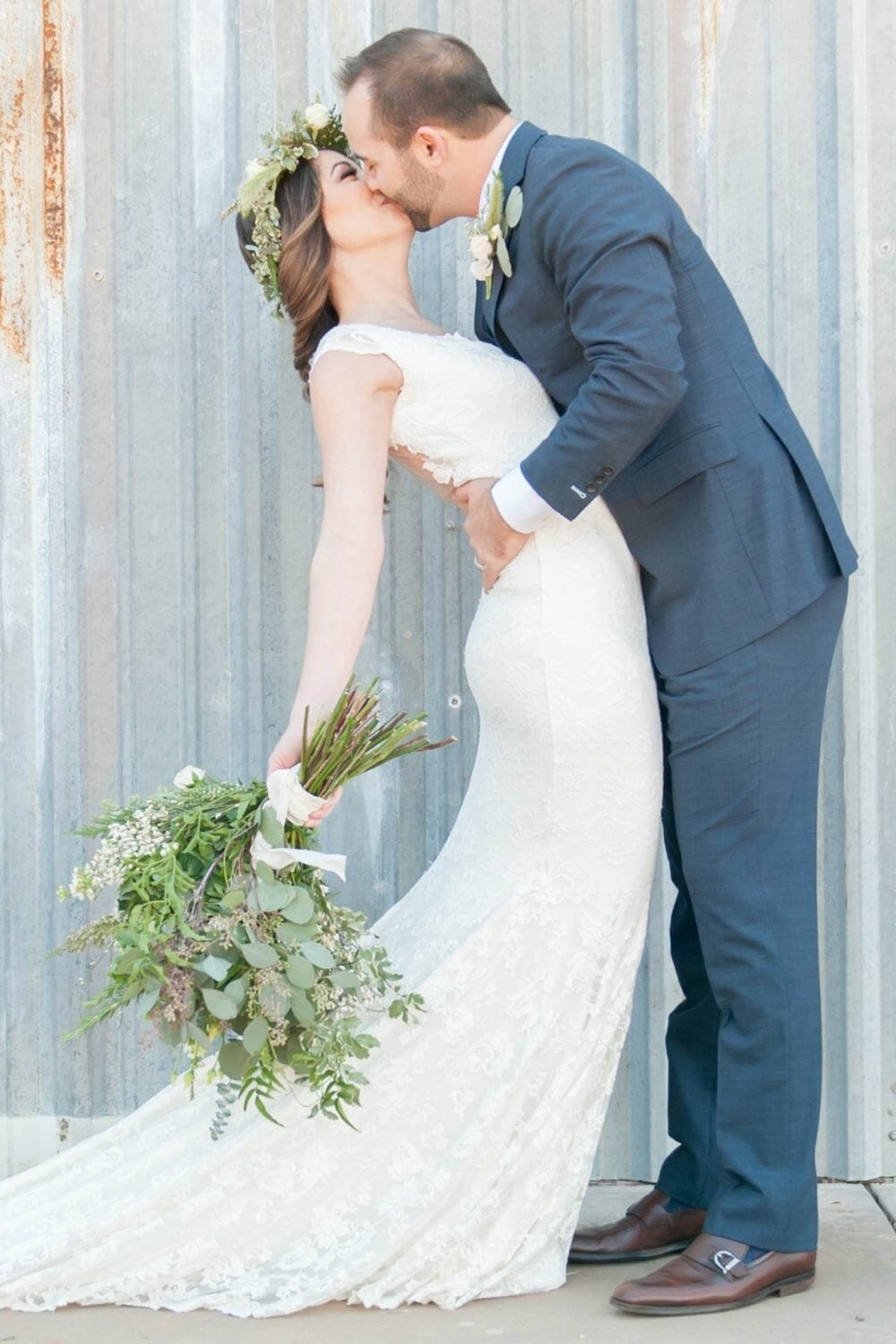 Bride kissing in a Trumpet-Mermaid Wedding Dress photo by Jesica Clay Photography