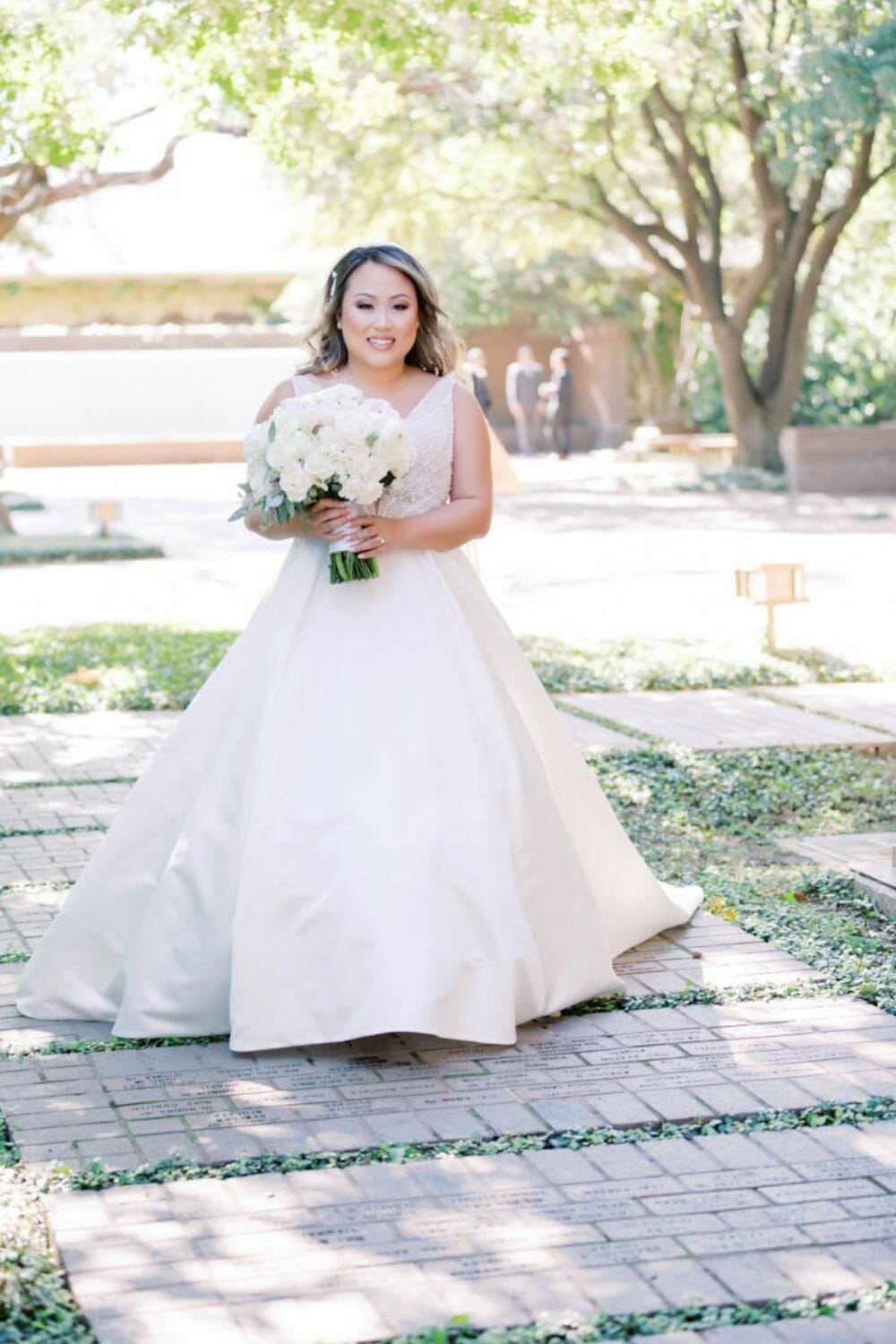 Bride walking in a Ball Gown Wedding Dress photo by Nhan Nguyen Photography