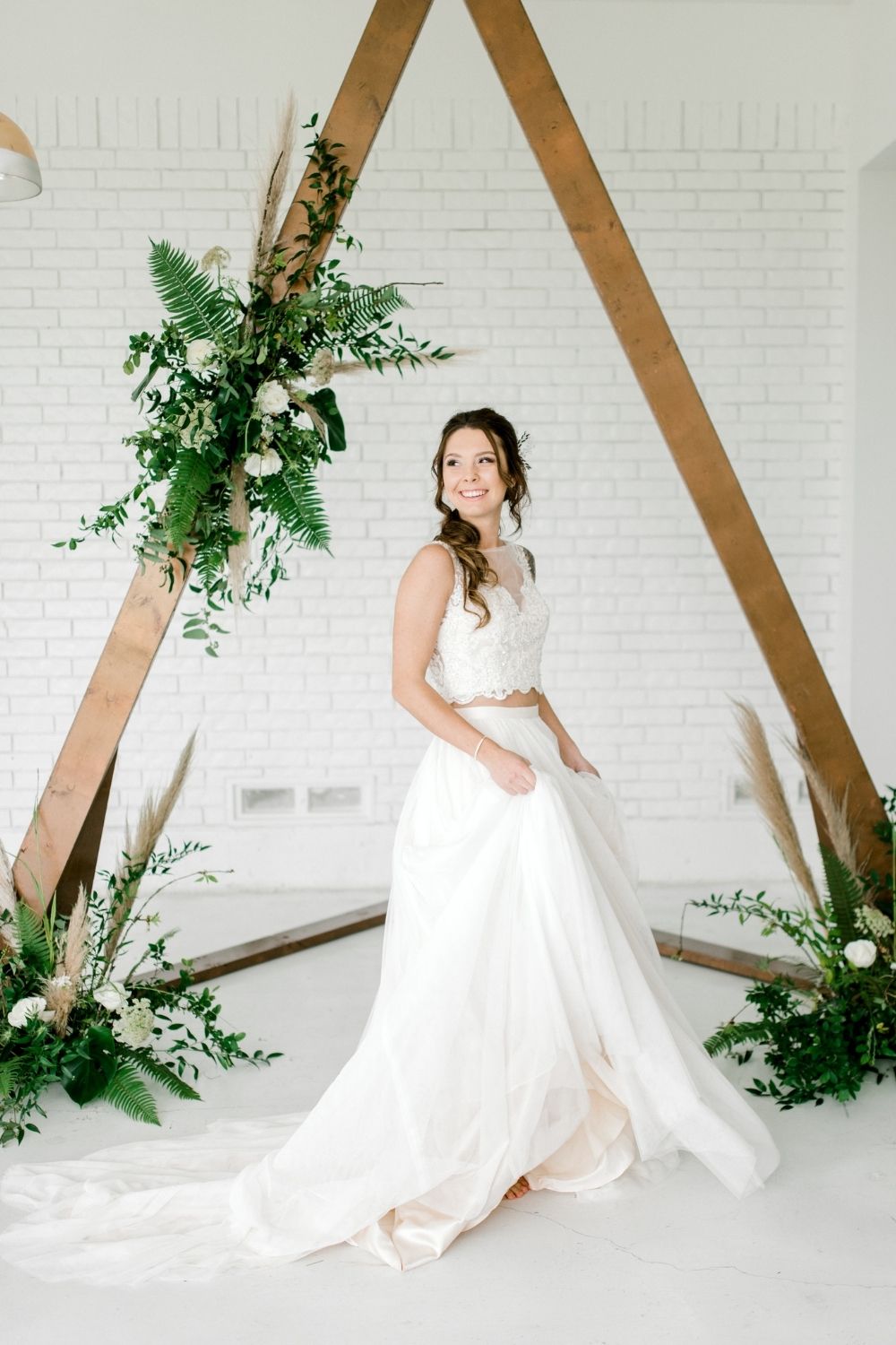 Bride in a white separates wedding dress style